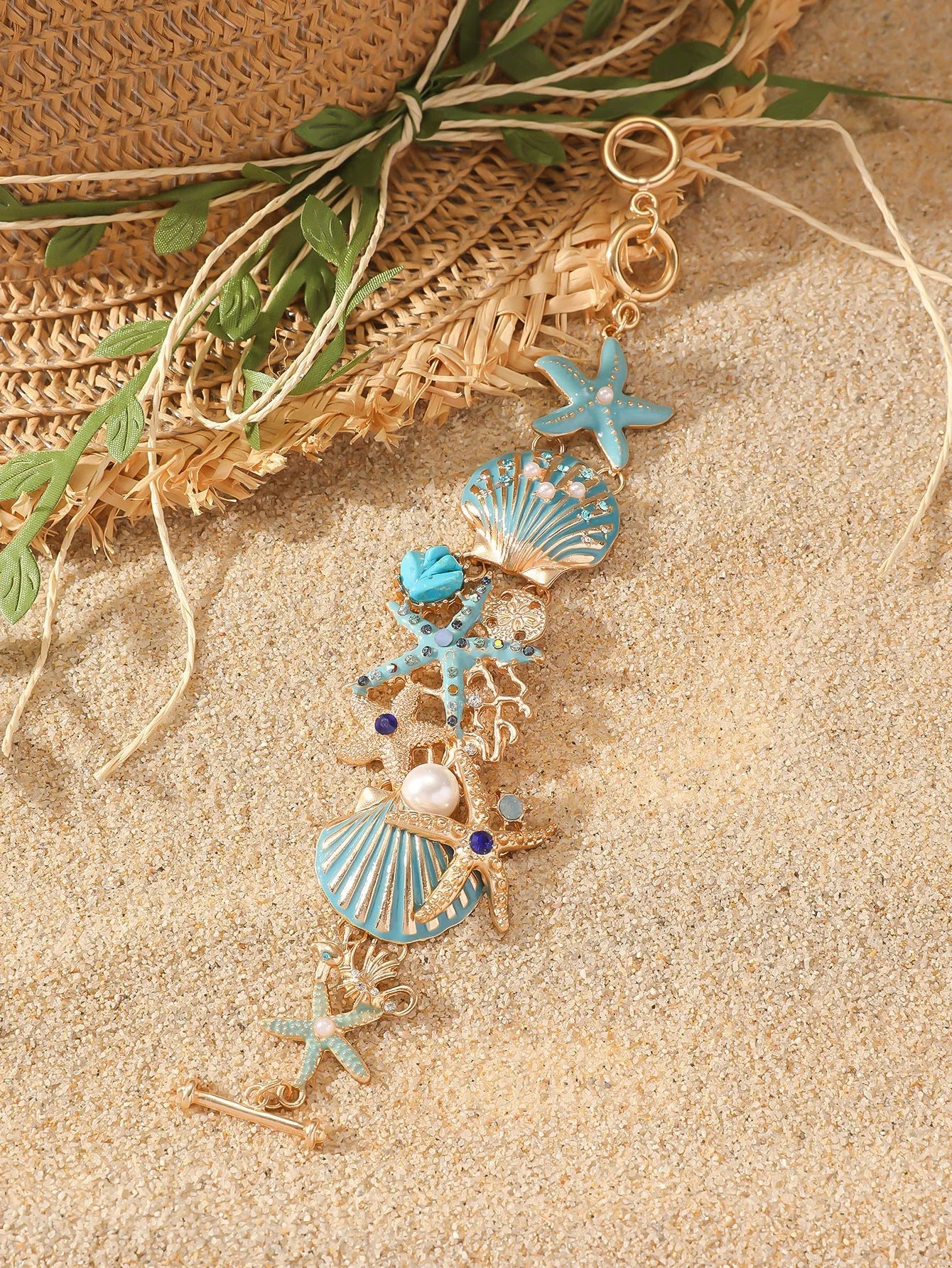 Alloy nautical bracelet with boat anchor charm, starfish detail, in turquoise, red, or blue.