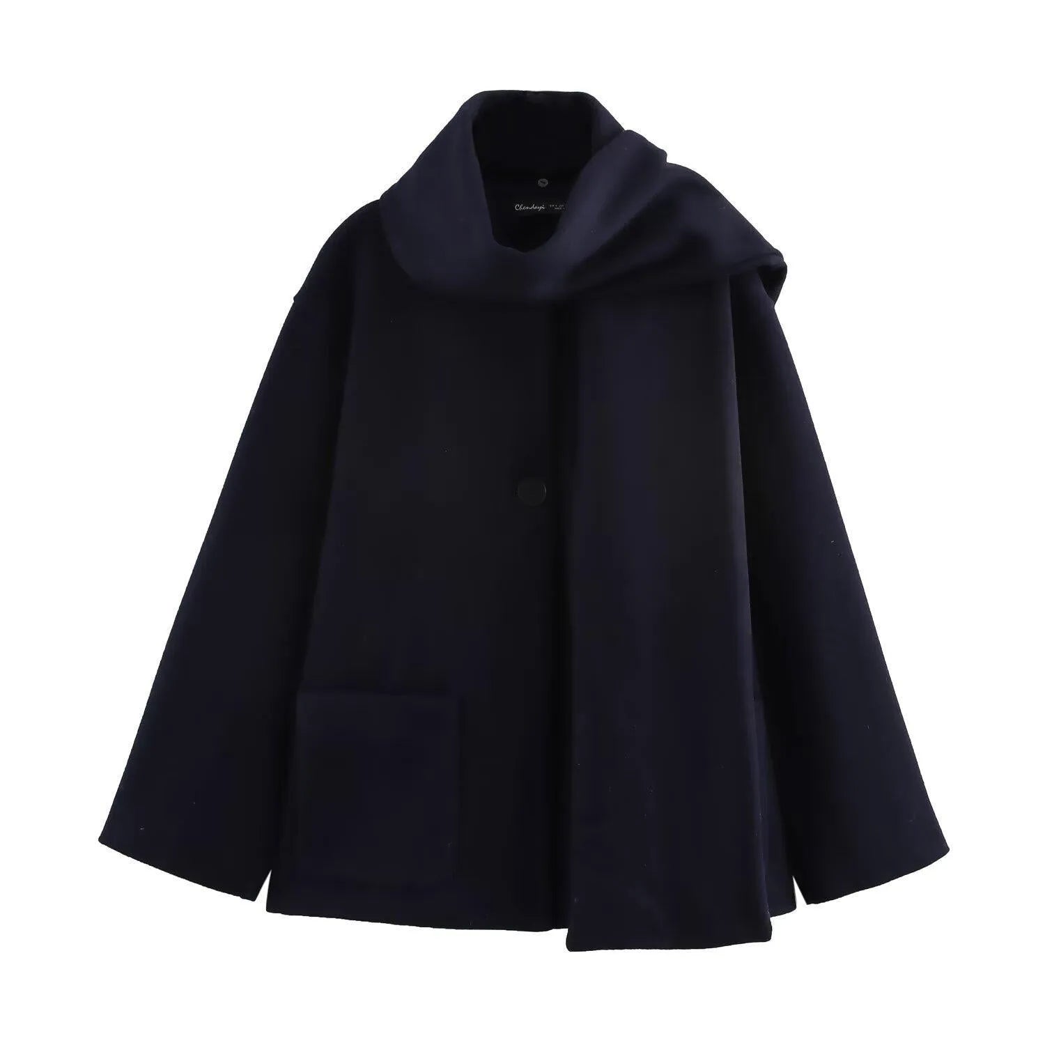 Women's long grey polyester overcoat with artificial fur collar on a model, showcasing street fashion style.