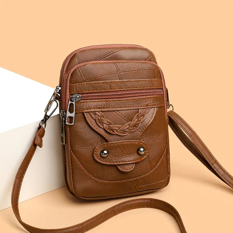 Soft leather retro mobile phone bag showing square vertical design with weaving patterns and decorative rivets