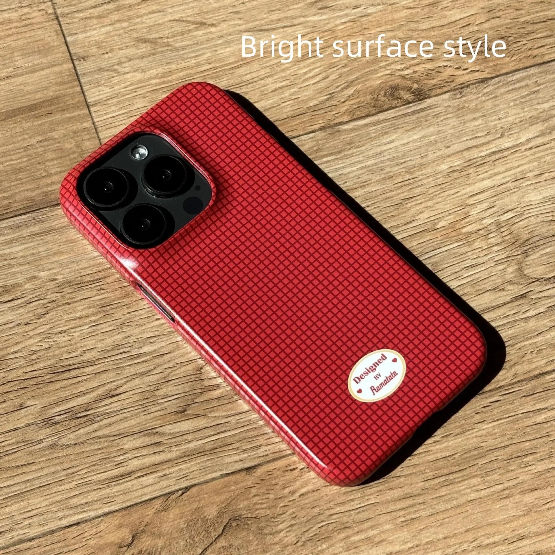 Original plain plaid design iPhone 15 Pro Max case in glossy red grid or frosted orange grid options.