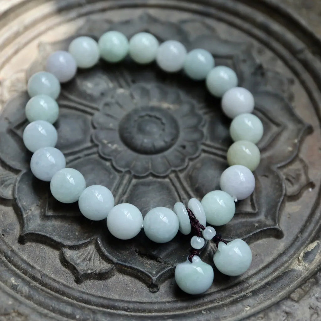 Natural jade bracelet with Maitreya Buddha and prosperity charm pendants