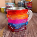 A painted bookmark design resin coffee cup ornament in Library or Pattern style.