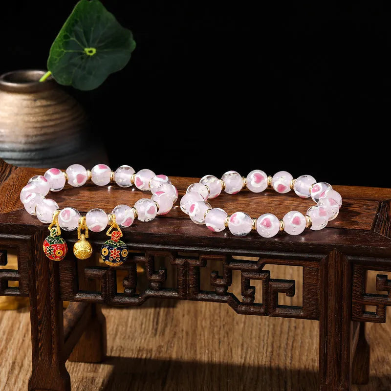 Handmade heart-shaped glass bracelet with swallowing gold beast pattern in ancient fluorescent glaze