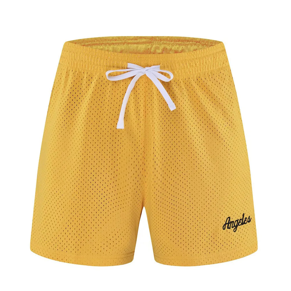 Men's black double-layer mesh shorts for sports and leisure, laid flat.