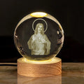 White crystal church ornament with etched purity theme on 6cm ball and warm LED light in wood base