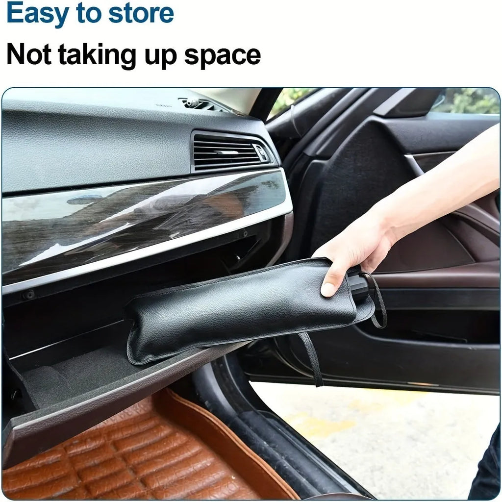 Foldable car windscreen sunshade umbrella open on a vehicle windscreen