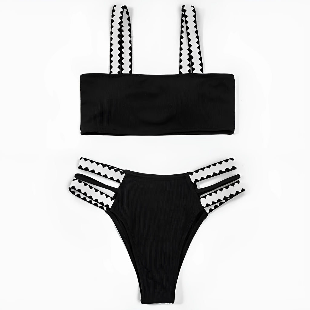 Black women's one-piece swimsuit with hollowed-out split design and briefs cut.