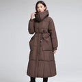 Women's knee-length padded jacket waist-cinching thicken coat in black with pockets