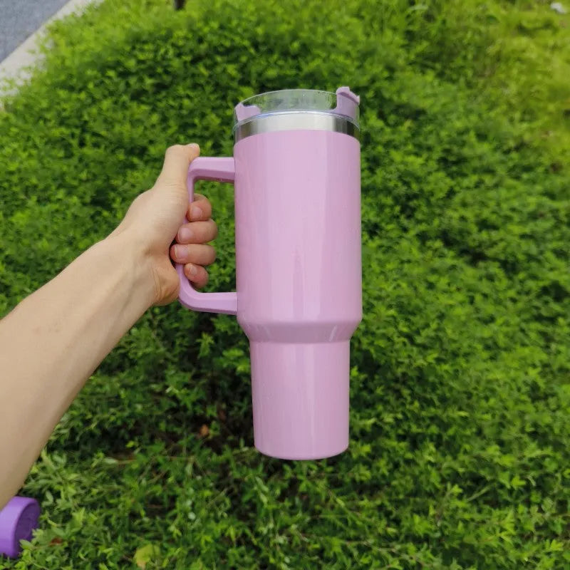 Stainless steel vacuum insulation cup in rainbow gradient colours showing double-layer construction