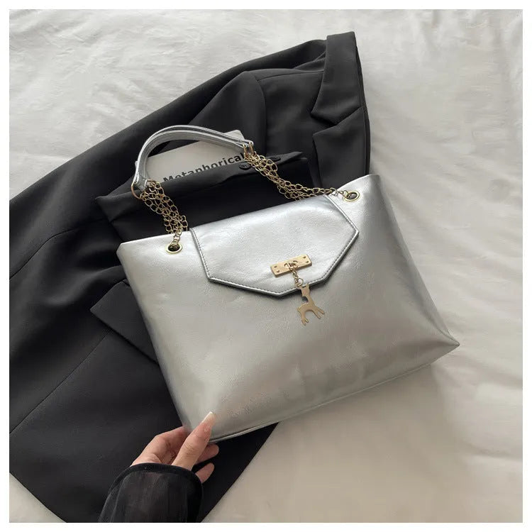 Large capacity chain shoulder bag for women in black, soft PU, horizontal square shape with chain strap