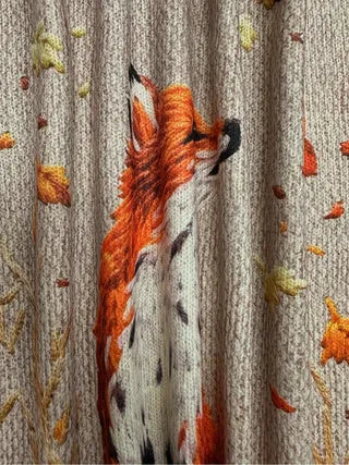 Loose fit digital printed top with lapel collar on a hanger, shown in a solid colour as a blank garment.