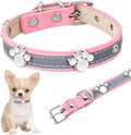 Adjustable PU leather dog collar with reflective stitching and a metal paw-shaped rivet.
