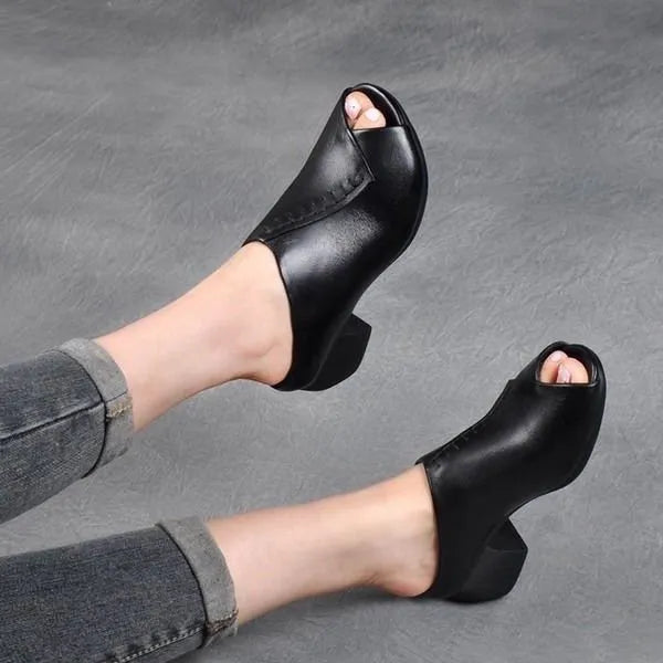 Women's black square heel peep-toe slippers with a fish mouth scaffold design on a rubber sole.