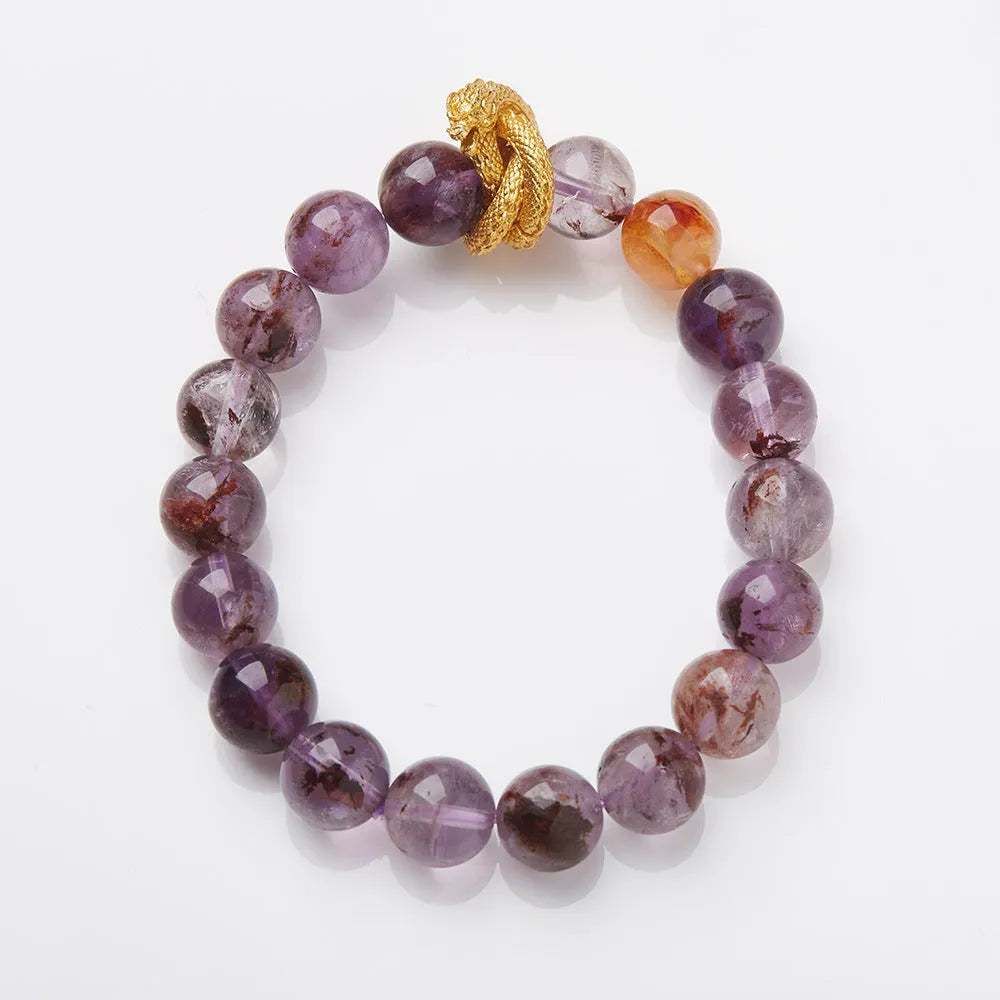 Purple cornucopia bracelet with nine purple crystals and zodiac animal design