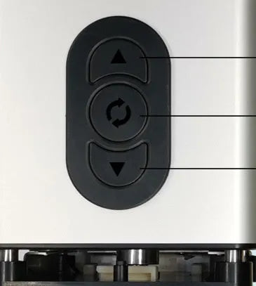 Black electric French fry cutter machine with stainless steel blades on a kitchen counter.