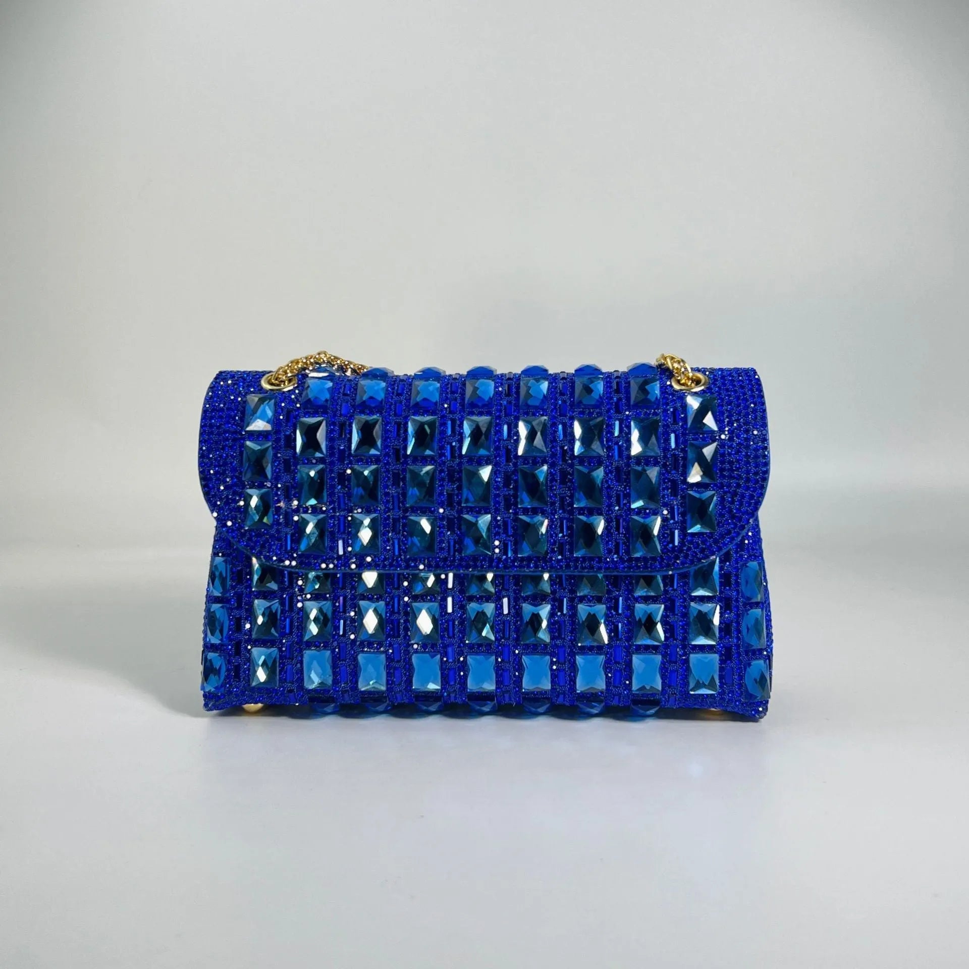 Glass rhinestone chain clutch handbag in horizontal square shape with retro styling and chain strap