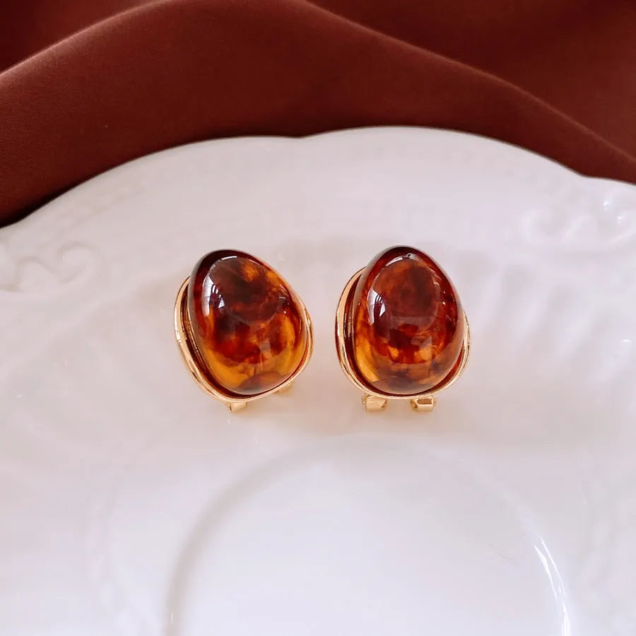 Amber water drop ear studs and ear clip in silver needle coffee colour with real gold plating