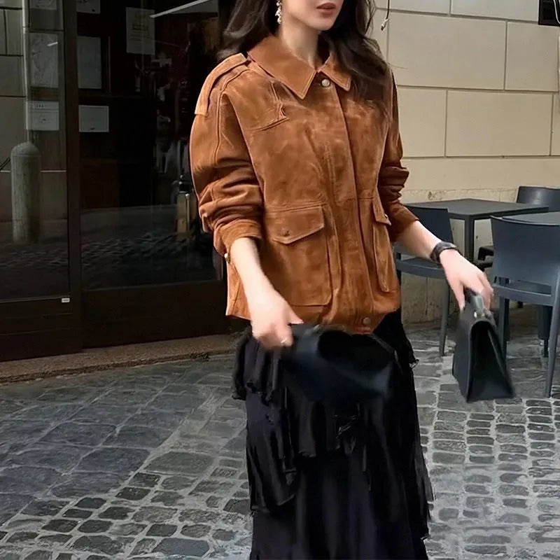 Women's brown suede-style street chic coat with regular sleeves on a hanger