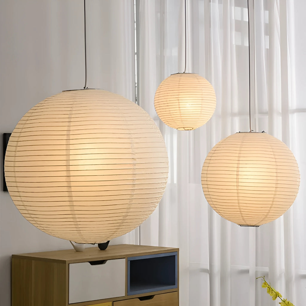 Modern flat circular paper pendant ceiling lamp with a three-colour light source.