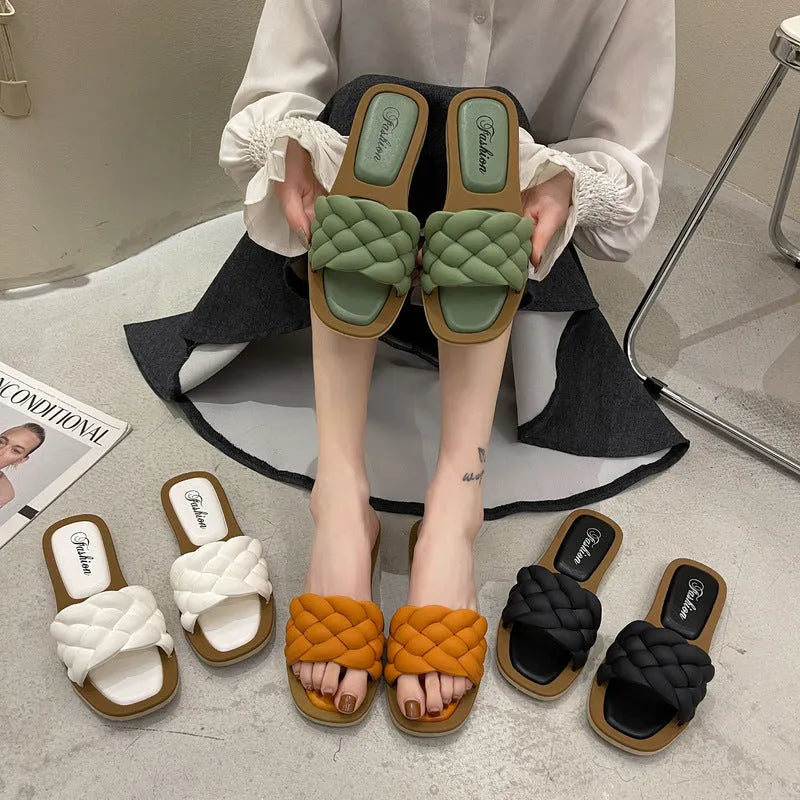 Women's plaid PVC beach sandals with a thick non-slip sole in green, shown from the side.