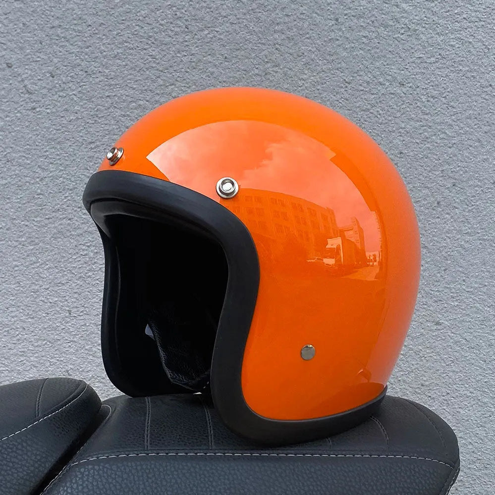 Cement Grey retro open-face motorcycle helmet with clear visor on a plain background.