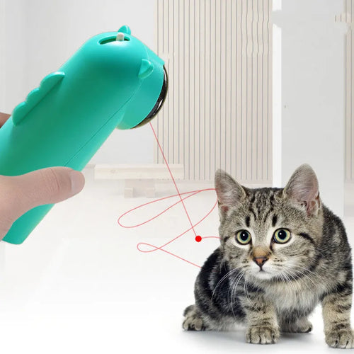 Automatic laser cat pole toy showing green with white plastic housing and LED red laser beam on floor