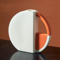 Modern ceramic vase in orange and white, 21.5x24x6cm with 10cm diameter, simple decorative style