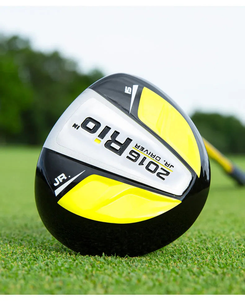 Children's golf club set featuring a forged aluminium driver, two iron poles, a putter, and a ball bag on a grassy field