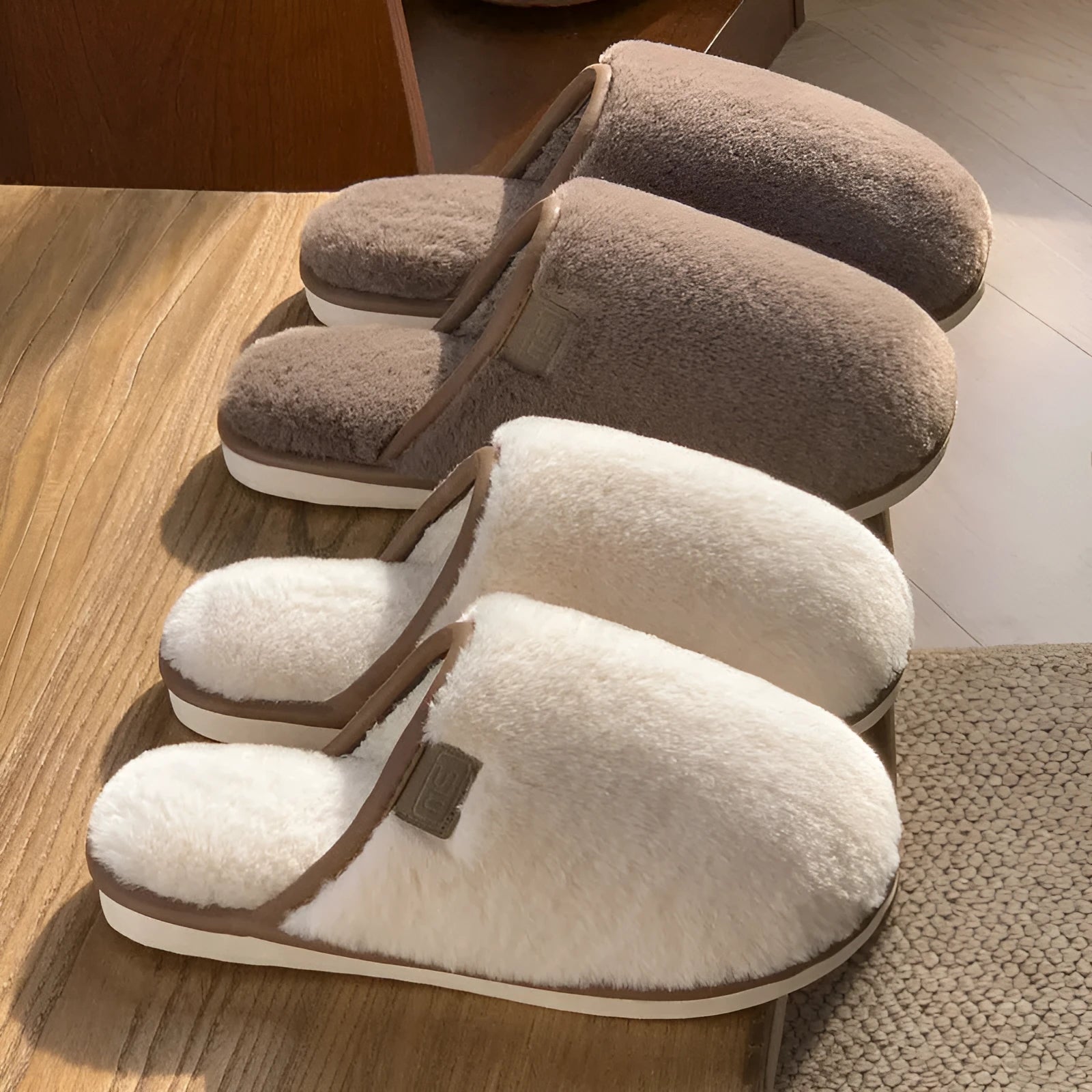 Winter plush slippers in blue with non-slip PVC sole and car stitching detail on the upper.