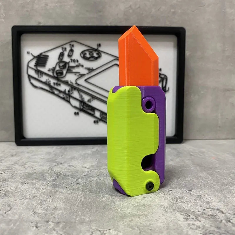 3D printed plastic gravity carrot knife fidget toy in orange, purple, and green colours.