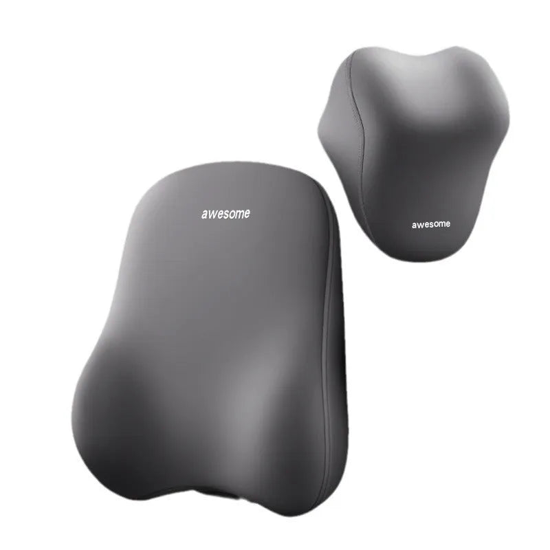 Black and beige memory foam car headrest pillow and lumbar support cushion on a vehicle seat.