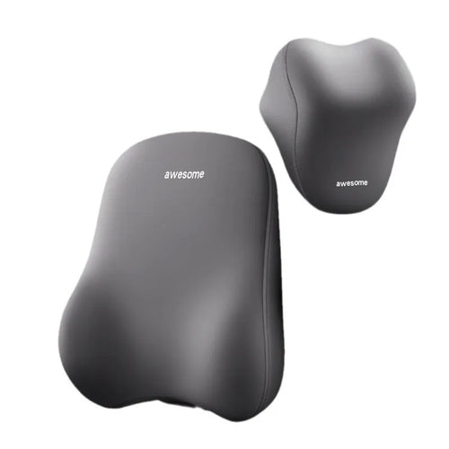 Black and beige memory foam car headrest pillow and lumbar support cushion on a vehicle seat.