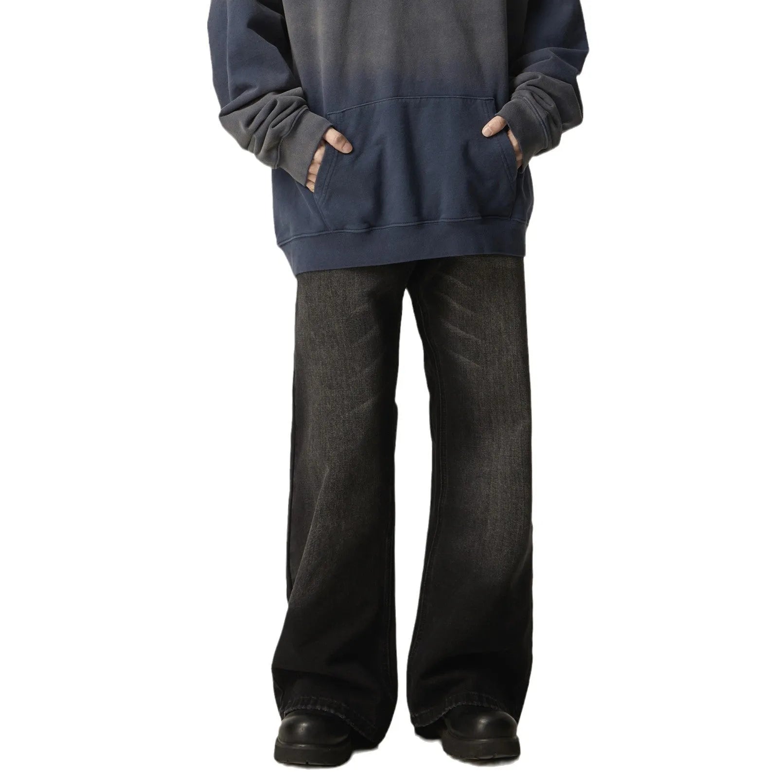 Black loose-fit straight leg denim jeans with a zipper fly on a neutral background.