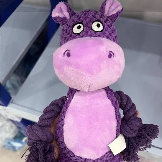 Hippo-shaped plush dog toy with cotton rope handle for tug-of-war and training.