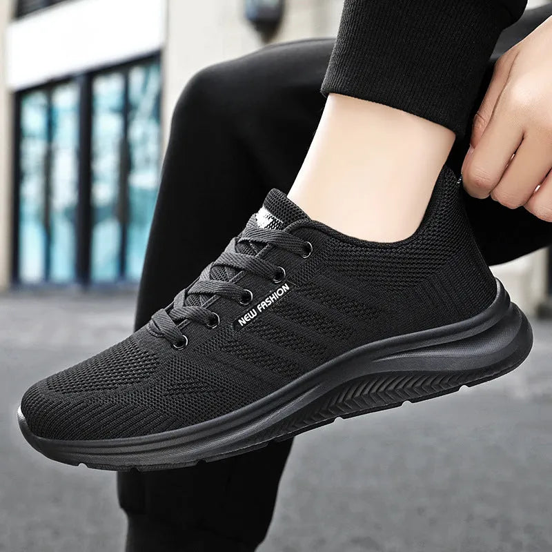 Unisex mesh upper casual trainers in solid colour, available in black, grey, and pink, sizes 36-44