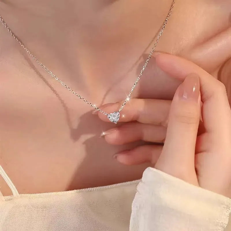 Silver-colour heart necklace with copper construction and simple pendant design