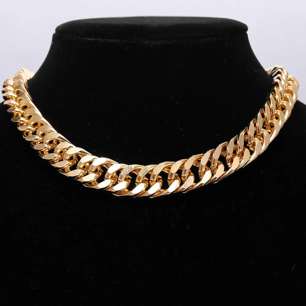 Gold tone women's necklace with thick 6cm chain links on a 32cm alloy chain, electroplated finish.