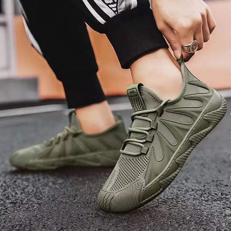 Men's black casual canvas sneakers with lace-up front and breathable mesh panels