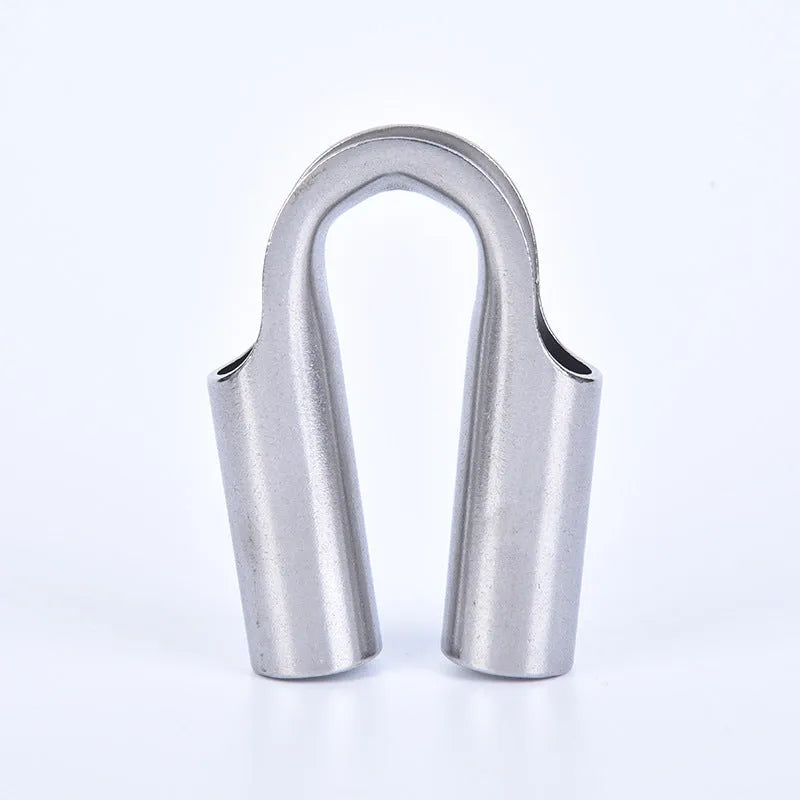 Stainless steel tubular chicken heart ring sleeve ring in round form on a white background.