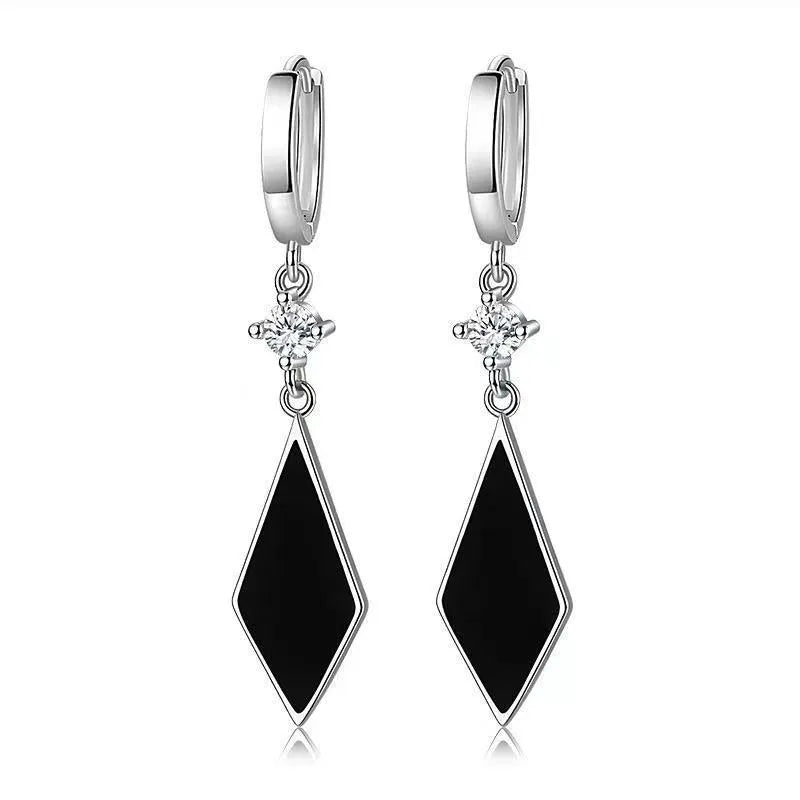 A pair of silver vintage diamond geometric clip-on earrings for women.
