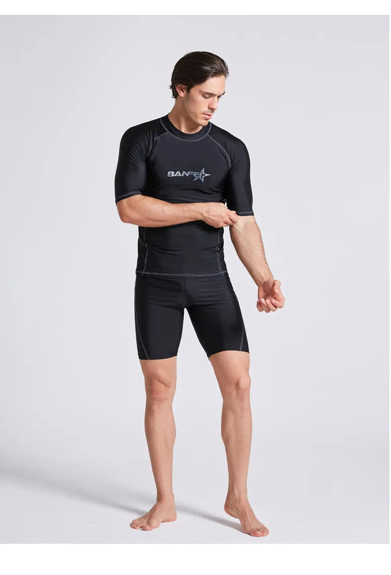 Men's quick-drying half sleeve nylon wetsuit top and pants for snorkelling and surfing