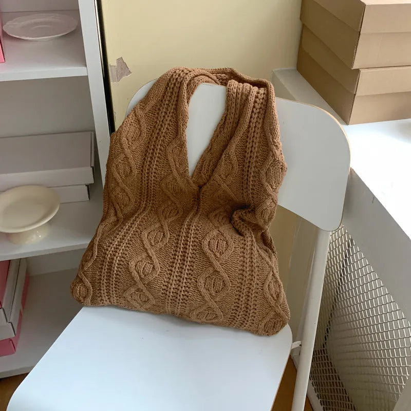 Retro hollow-knitted polyester shoulder tote bag in grass green, showing double straps and textured crochet design.