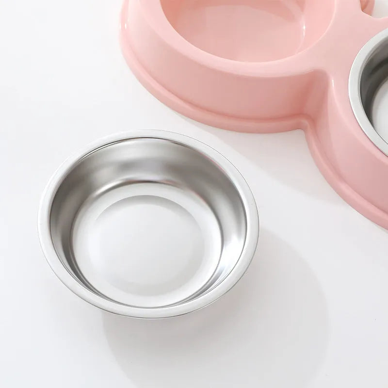Stainless steel pet bowl with frog decoration and double compartments for food and water separation