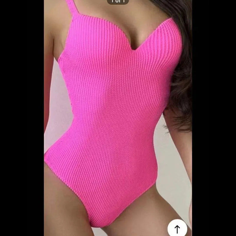 Women's sleeveless one-piece swimsuit in a small sunken stripe pattern, shown in multiple colours.