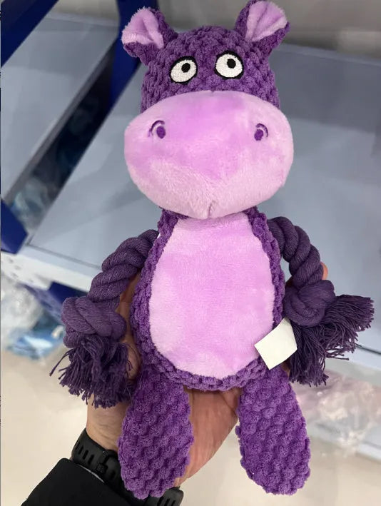 Hippo-shaped plush dog toy with cotton rope handle for tug-of-war and training.