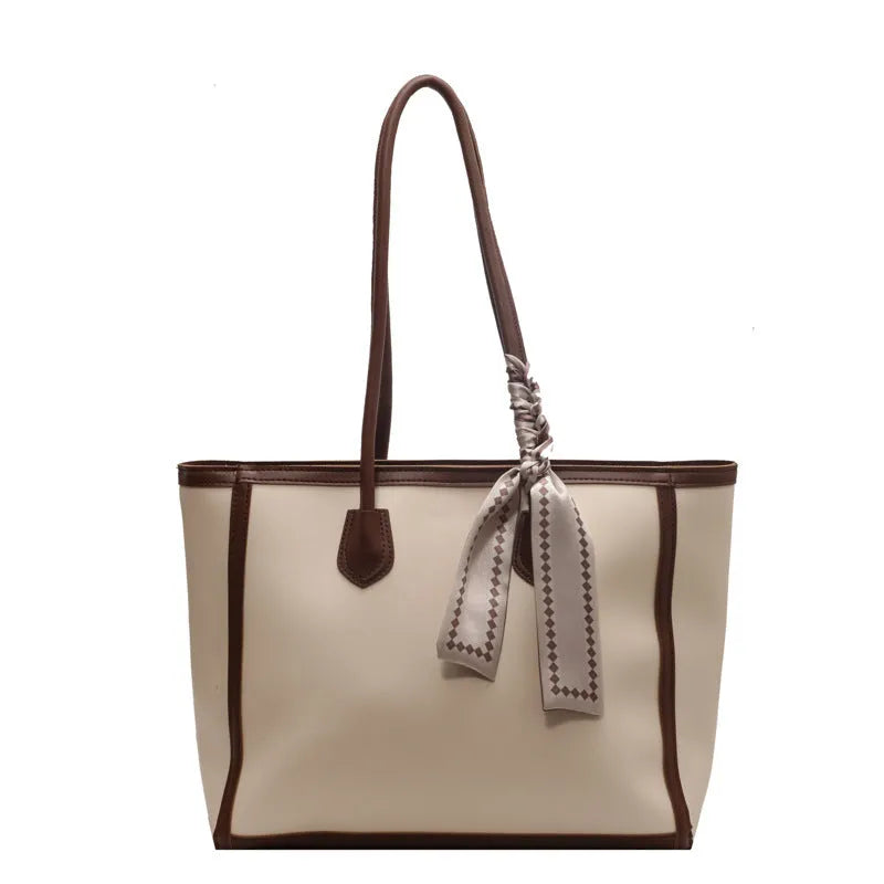 Soft PU leather commuter tote bag showing open outer pockets and horizontal square design