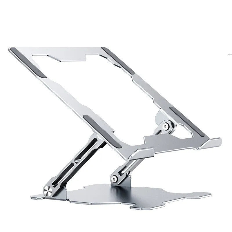 Grey aluminium laptop stand with adjustable angle, folded flat next to a laptop.
