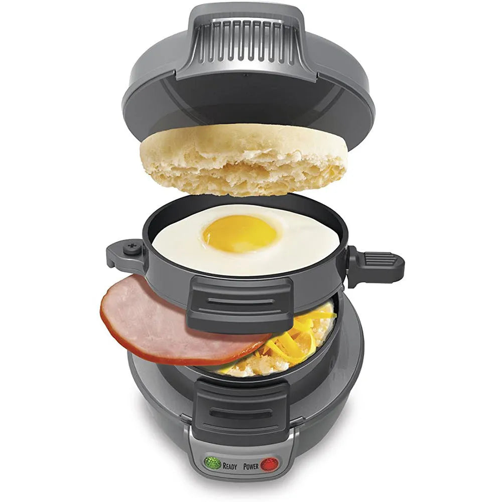 Household breakfast machine sandwich maker with egg cooker ring, 750W, in silver gray on a kitchen counter