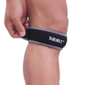 Black and grey patella retinaculum knee brace for sports protection.