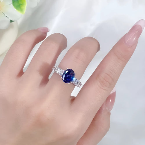 Heart-shaped high carbon zircon stone set in a sterling silver women's ring, shown in a Tan Sang colour.